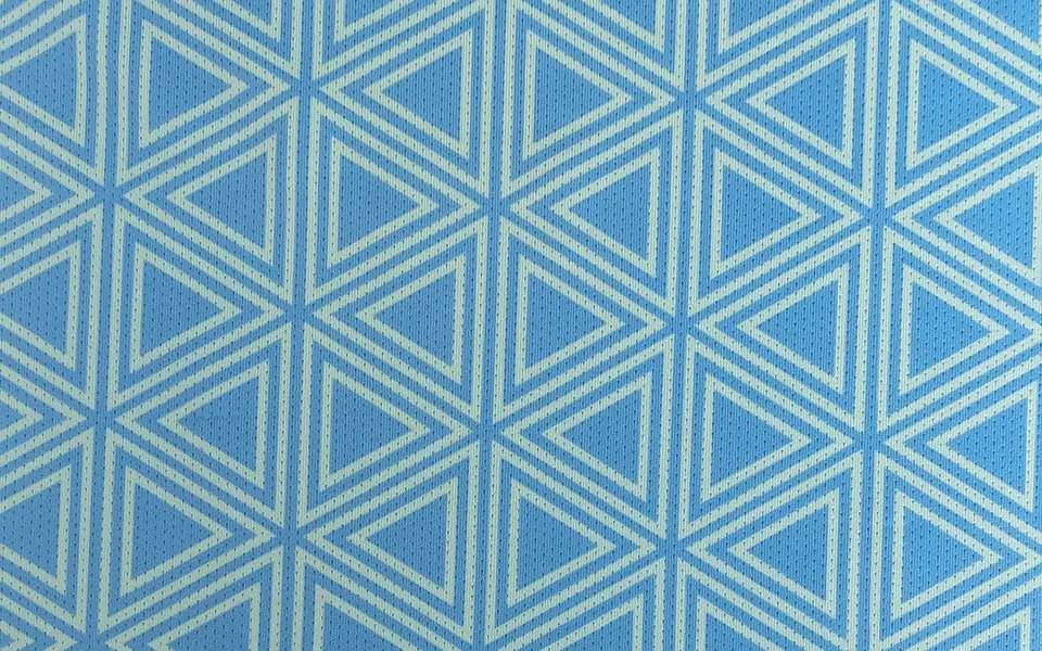 Blue mesh fabric with pale geometric triangle printing
