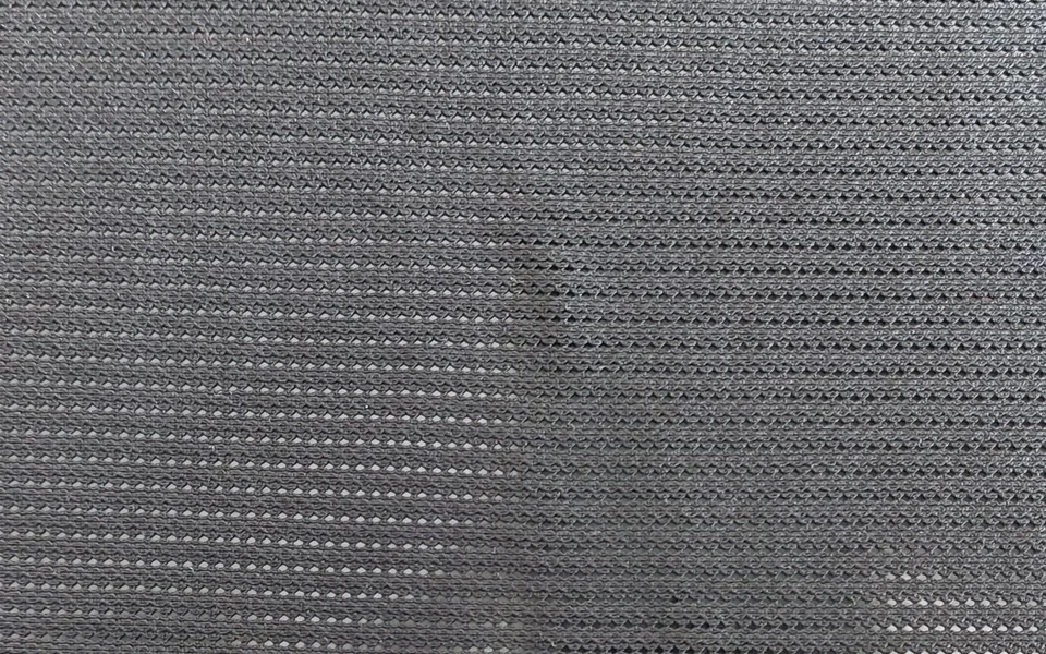 Grey fine mesh with small regular openings
