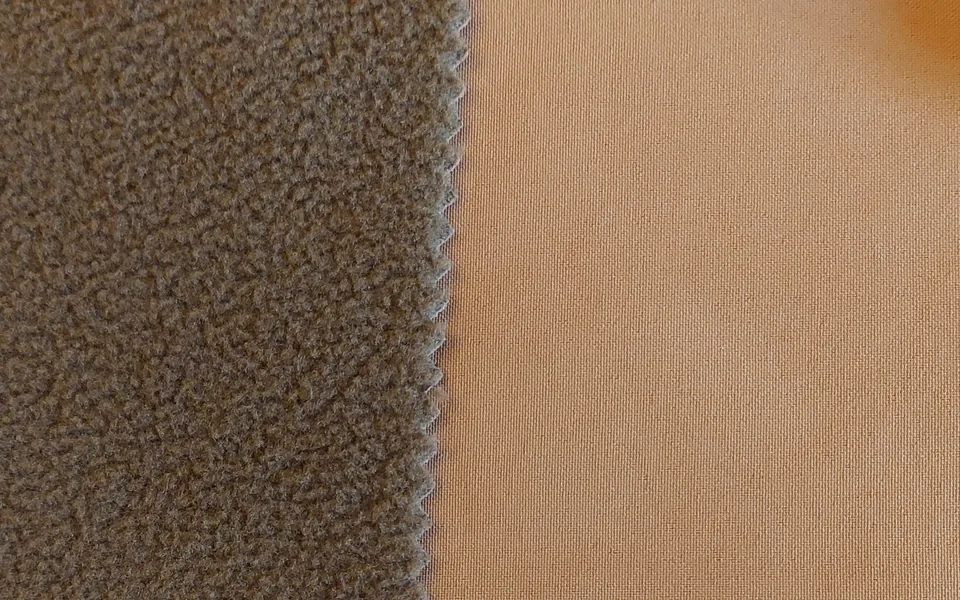 Tan fabric face beside a textured brown reverse
