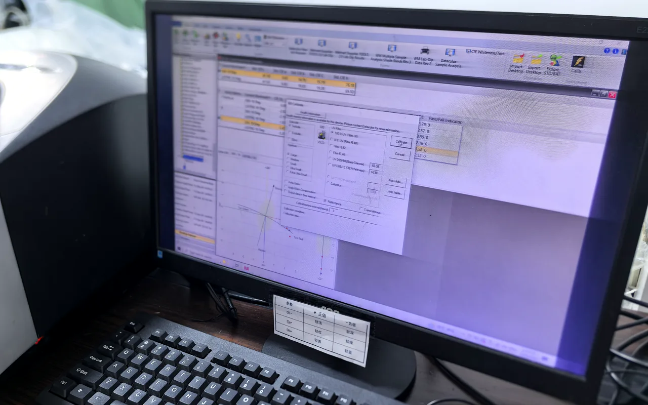 Fabric colour being reviewed at a colour measurement workstation